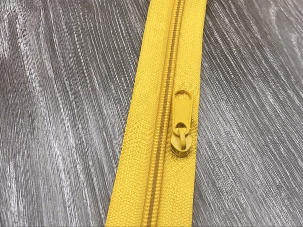 Reißverschluss Endlos Detail gelb